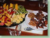 Vegan breakfast of fruit and nuts